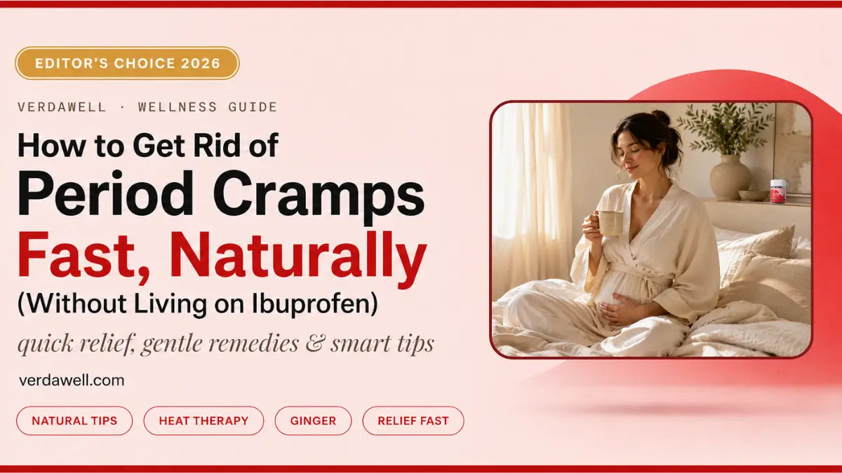 Woman easing period cramps naturally with warmth and calm in soft morning light